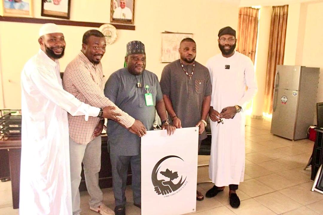 Peaceful Horizon International Ambassadors Pay Courtesy Visit to Kogi State INEC REC, Dr. Oliver Tersoo Agundu